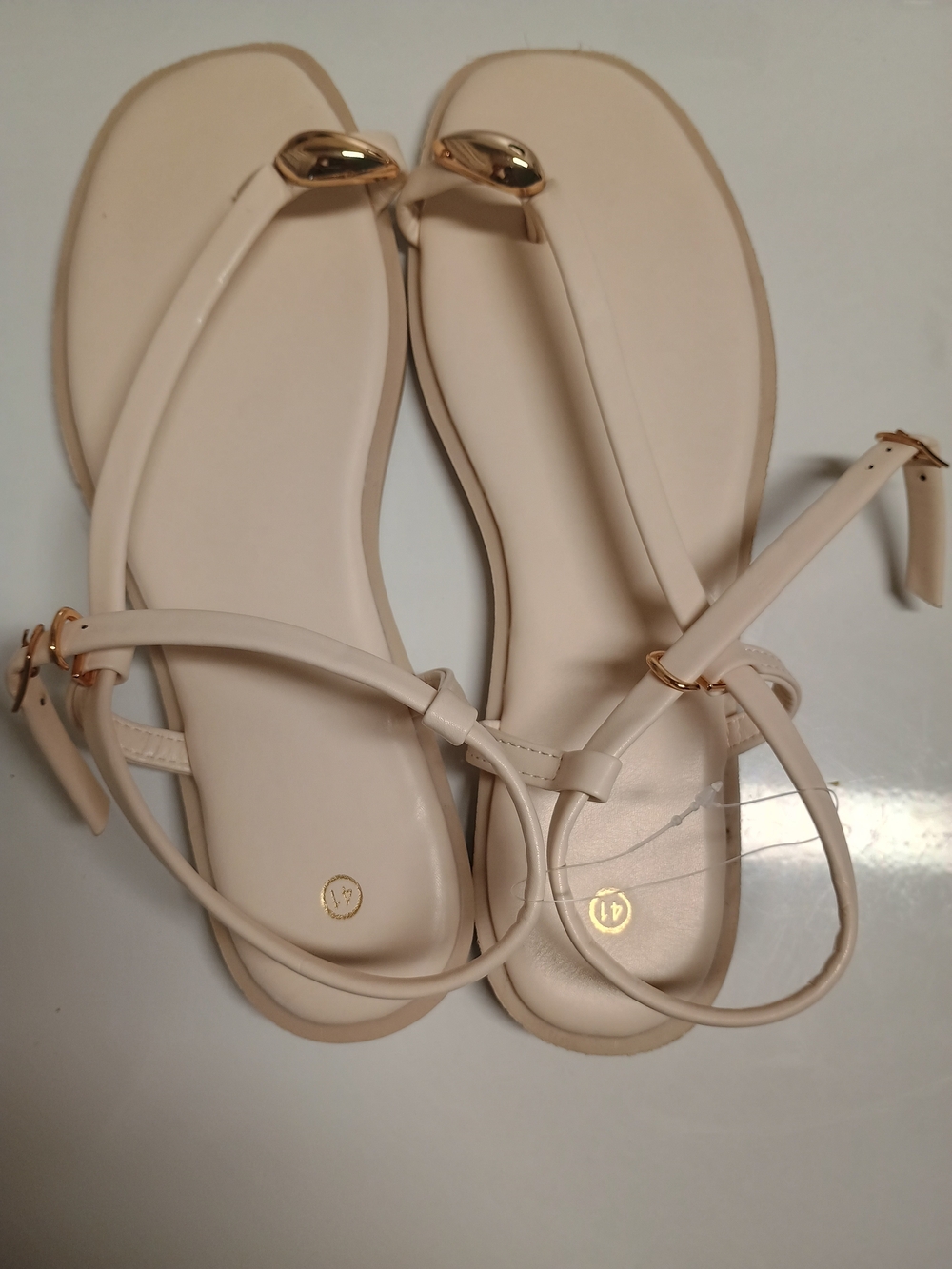 Women’s Nude T-Strap Sandals with Gold Accent